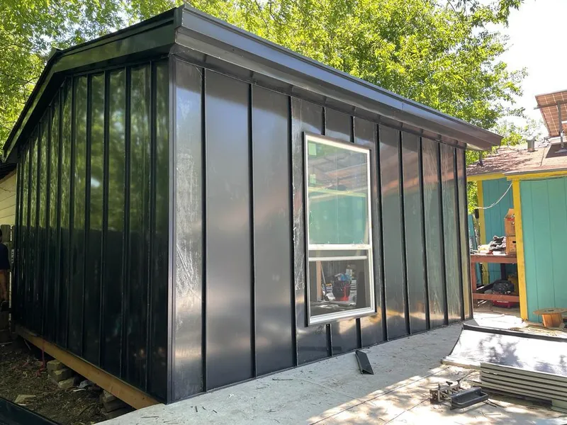 Black standing seam metal wall panels for Metal Roof Installation in Aurora